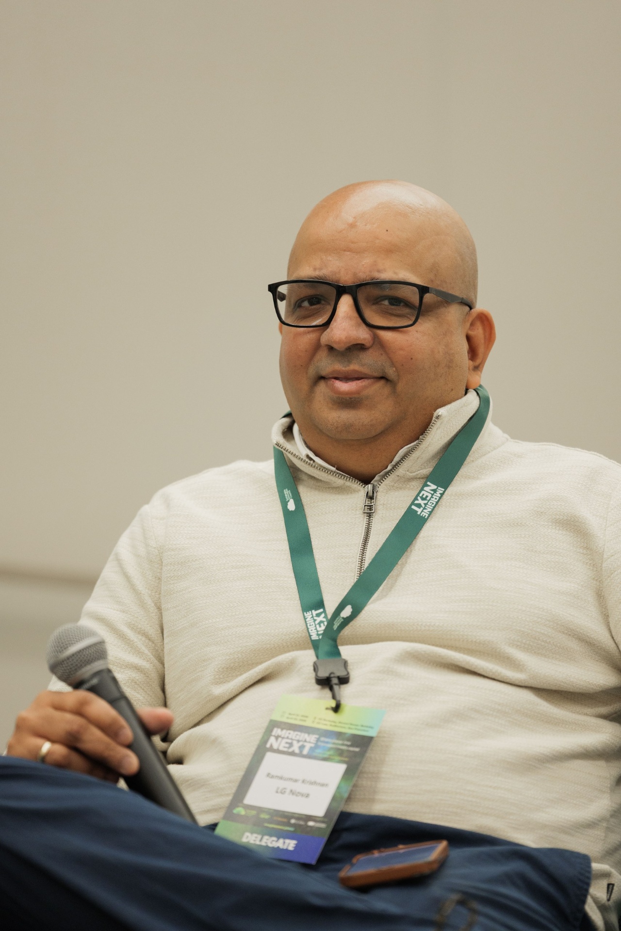 Portrait of Ramkumar Krishnan, Head of Cleantech Incubation at LG NOVA, holding the mic on the Capital Day panel