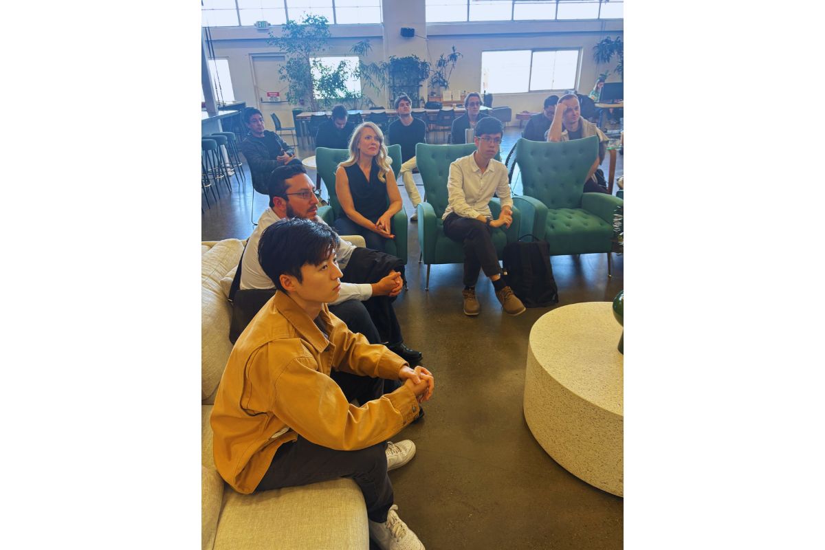 Attentive founders and investors seated and listening intently during the Frontiers Day visit at SOSV San Francisco