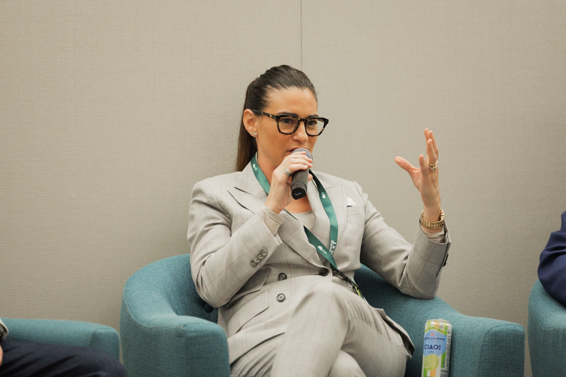 Dr. Tobi Ann Petrocelli, Director of Sustainable Project Design Activity at Arup, gesturing while speaking on the Capital Day built-environment finance panel