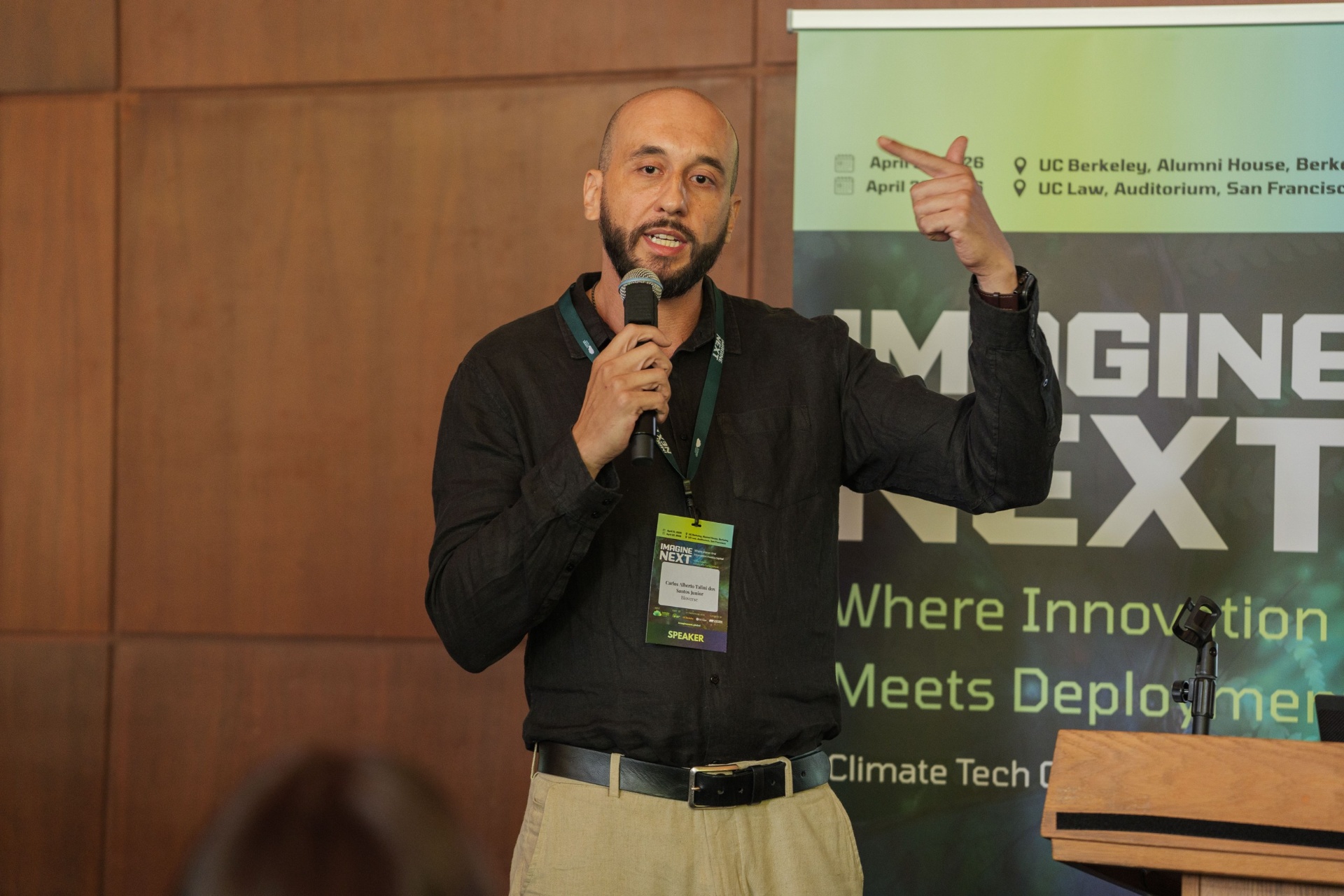 Bioverse founder Carlos gesturing during the pitch presentation