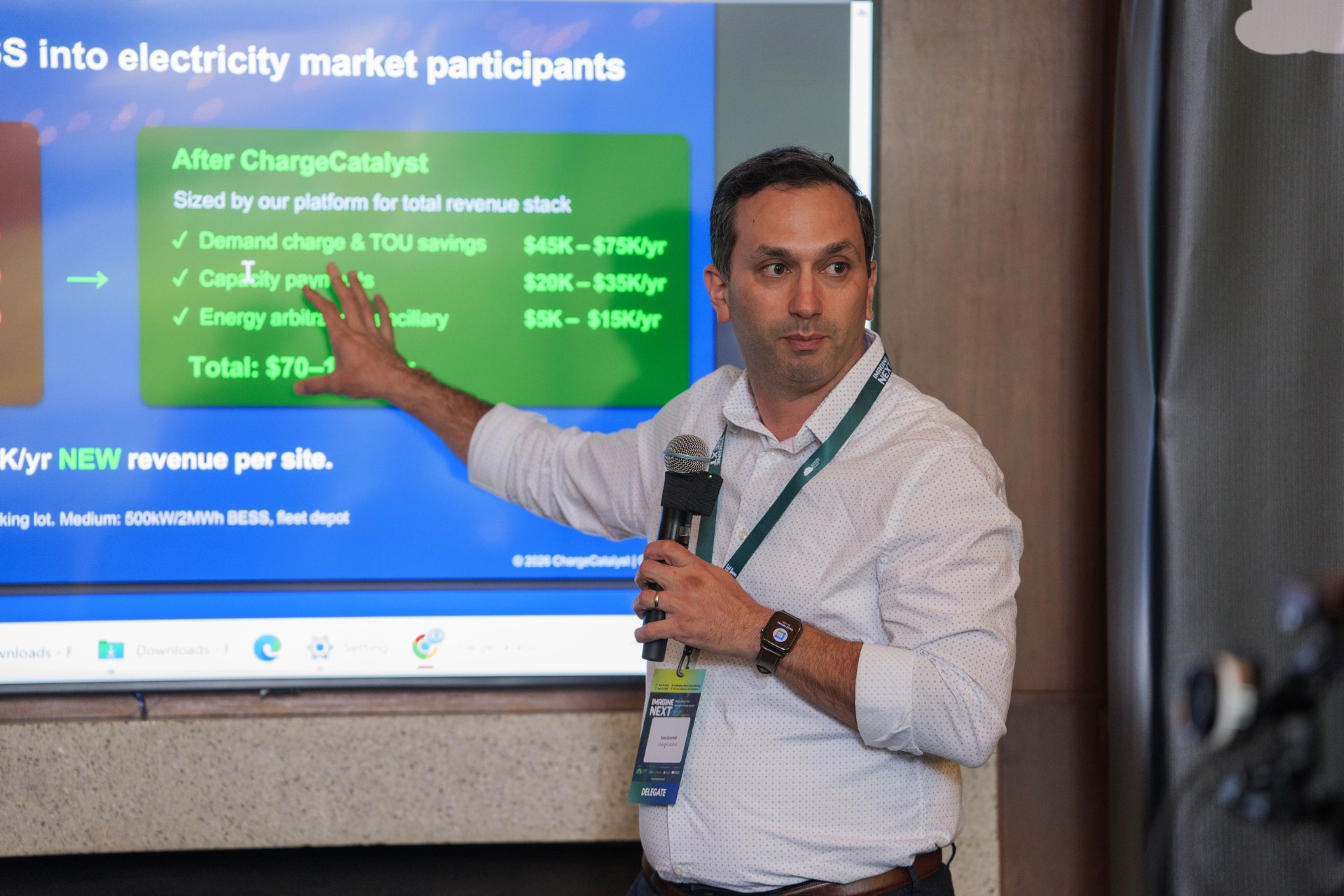 ChargeCatalyst founder Sam Komol presenting new revenue per site breakdown