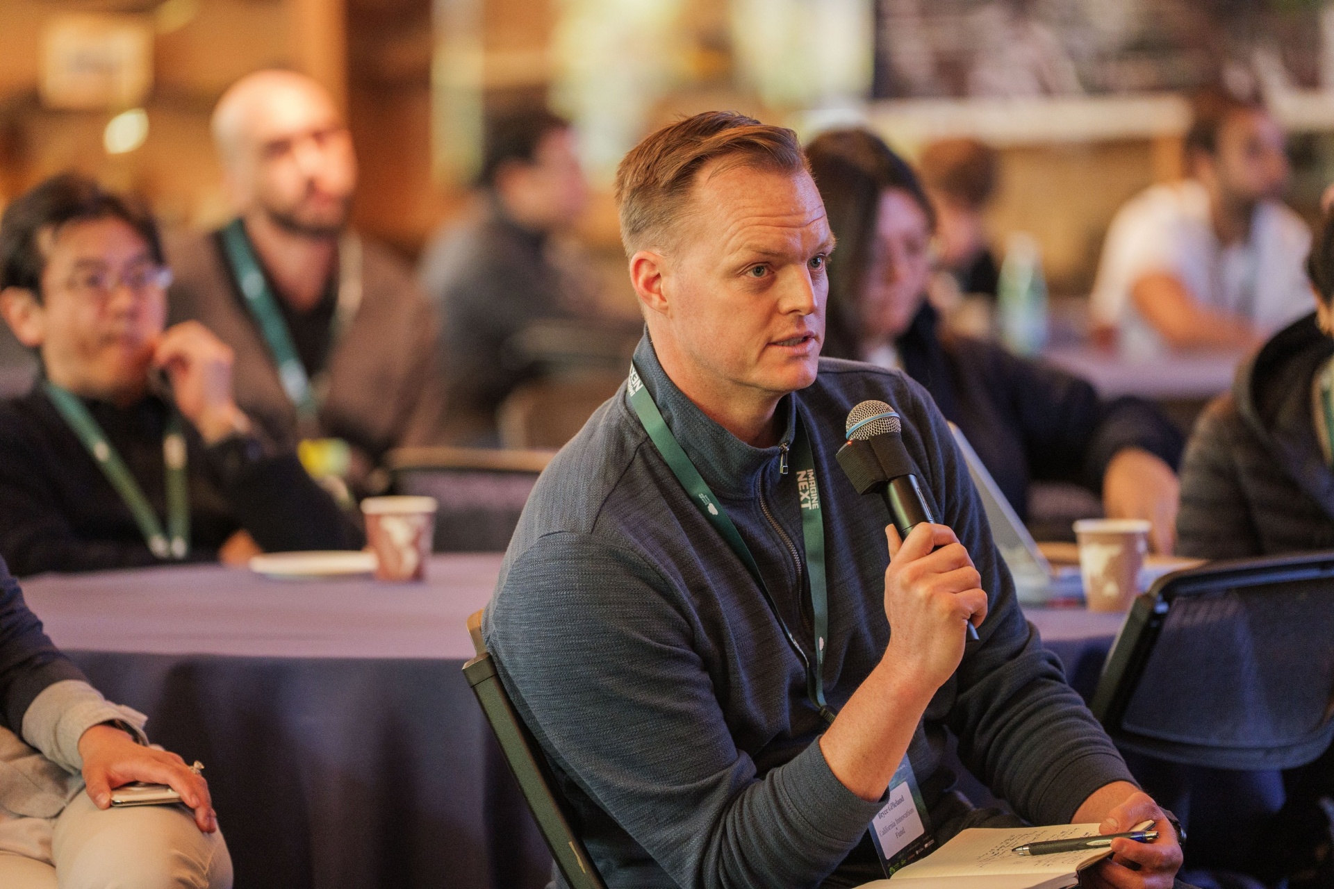 Bryce Gilleland of California Innovation Fund asking a question from the audience