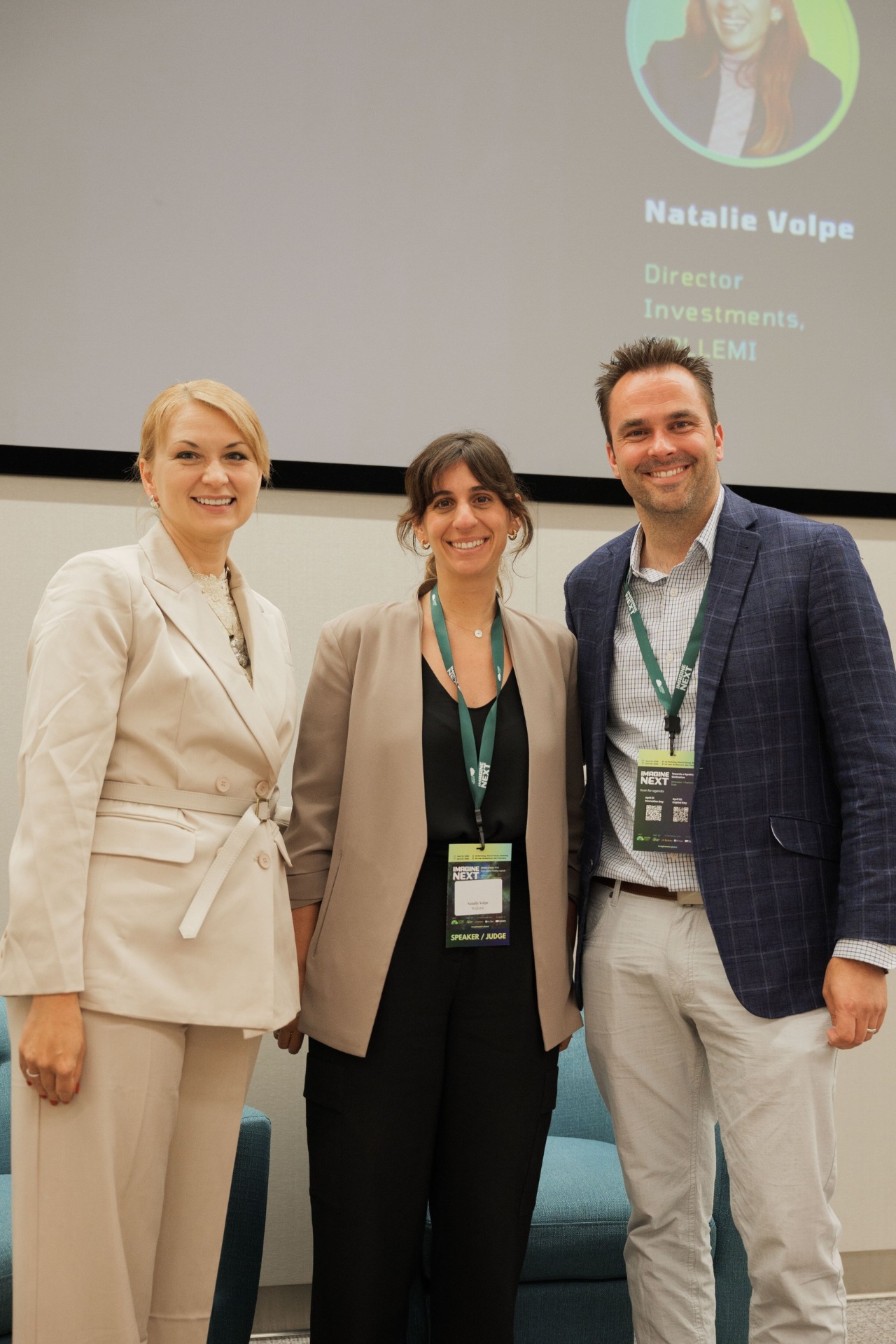 Natalie Volpe, Director of Investments at WOLLEMI, on stage with two Imagine Next jurors after the Capital Day fireside chat at UC Law SF