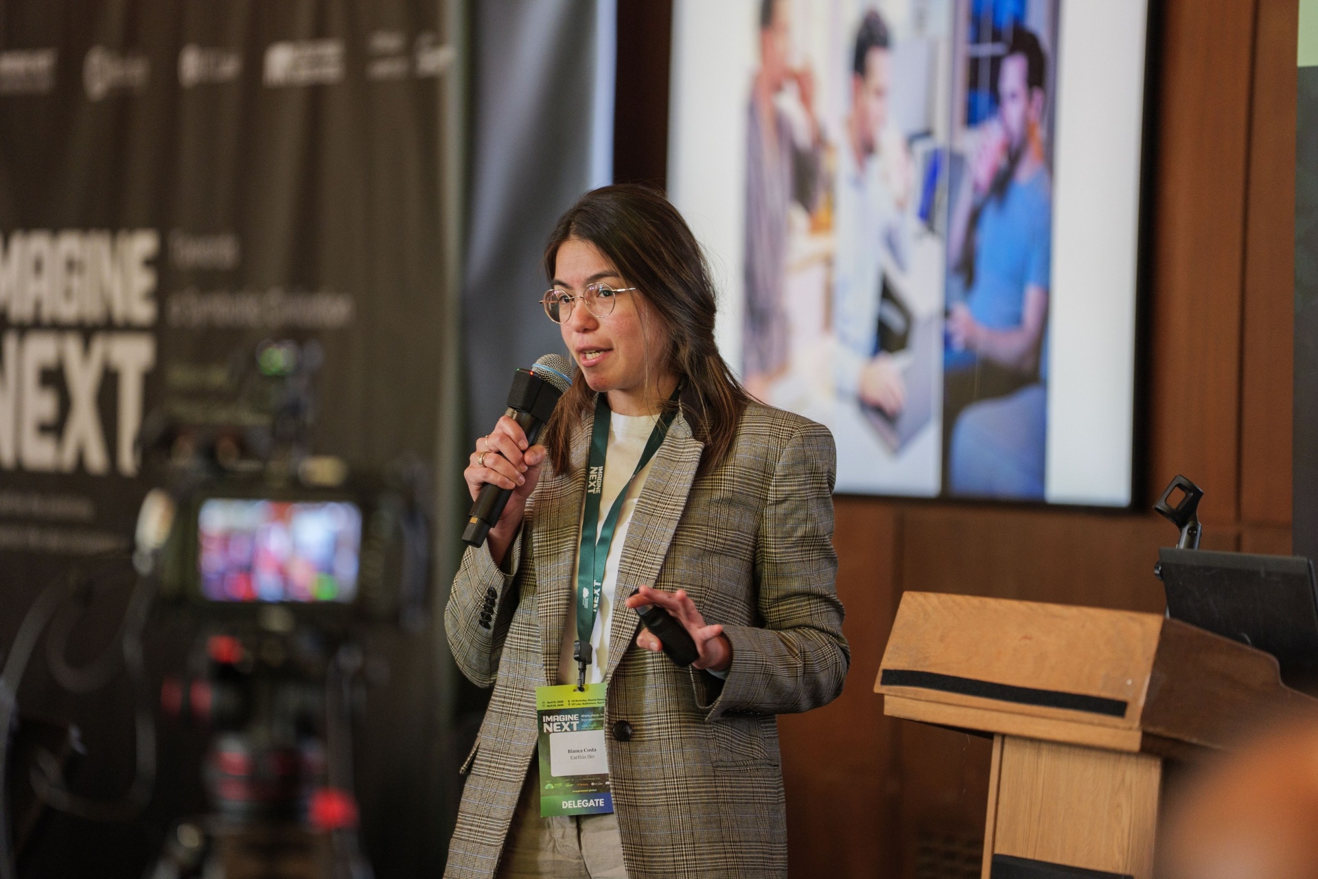 Earthia Bio founder Bianca Costa speaking on stage