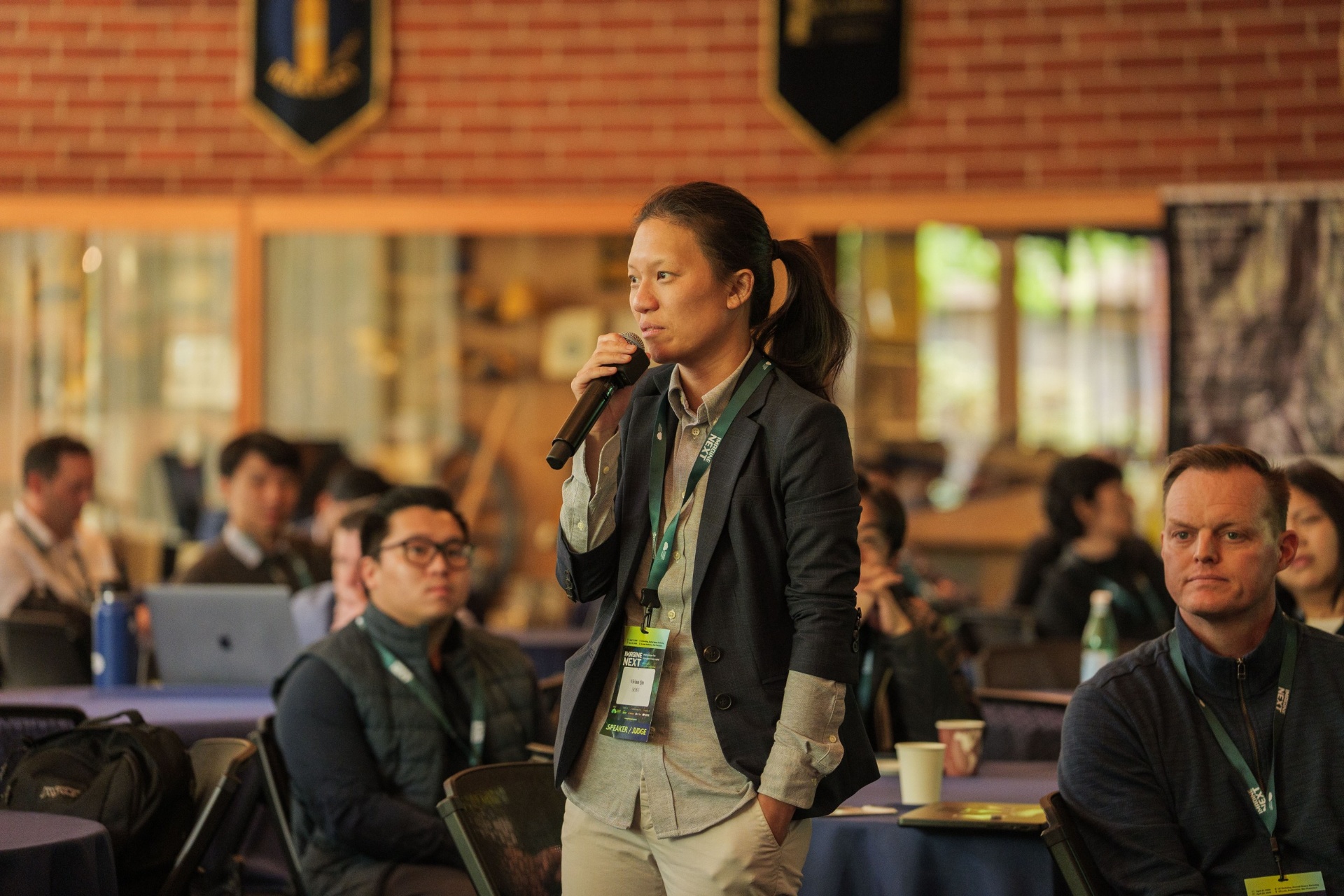 SOSV Venture Fellow Vivian Qu asking a question from the audience